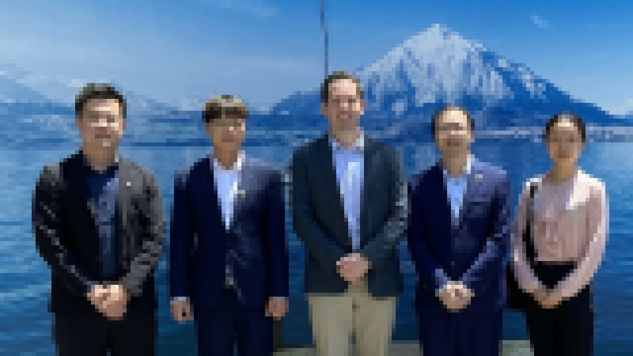 AGIN国际厅大会执委会执行秘书长何强一行访问瑞士驻华使馆
